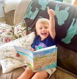 Child_Reading_Higgins_the_Hero